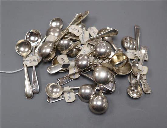 Thirty three assorted 19th century and later silver condiment spoons.